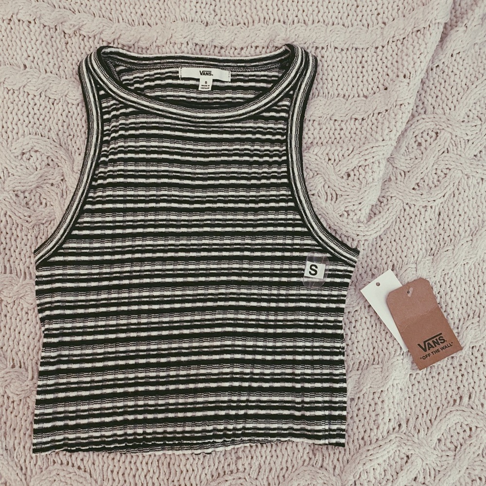A cropped black and white halter top.